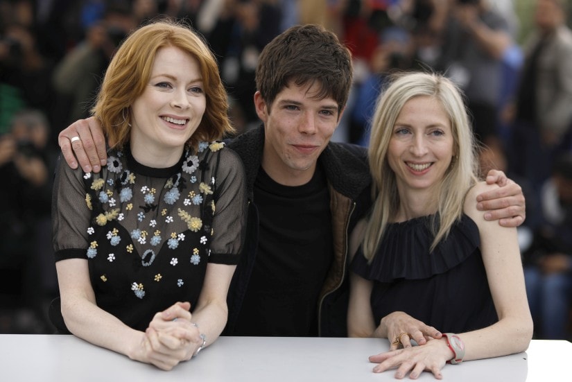 Actress Emily Beecham, from left, director Jessica Hausner and actor Phenix Brossard pose for photographers at the photo call for the film 'Little Joe' at the 72nd international film festival, Cannes, southern France, Saturday, May 18, 2019. (AP Photo/Petros Giannakouris)