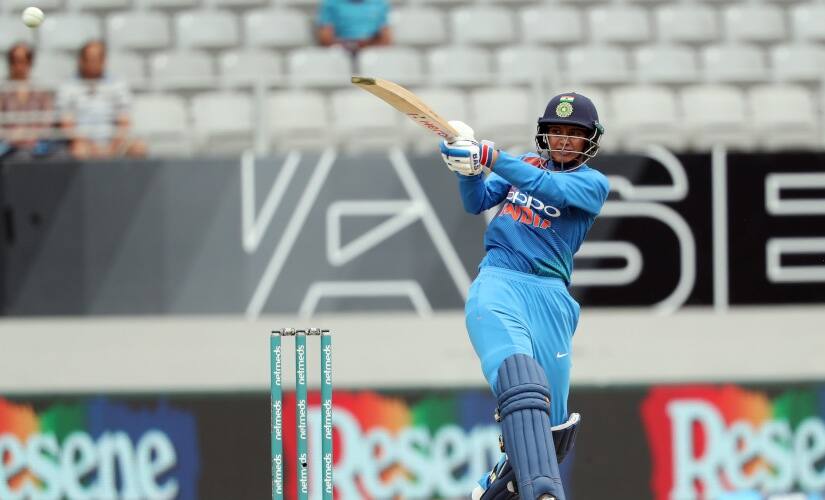 Mandhana unleashes one her ferocious pull. AFP