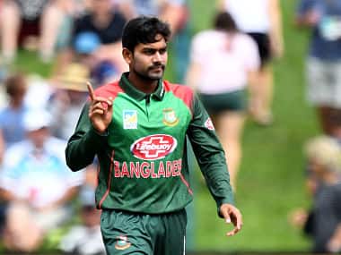 Bangladesh’s Mehidy Hasan Miraz celebrates the wicket of New Zealand’s Henry Nicholls during the third one-day international cricket match between New Zealand and Bangladesh at University Oval in Dunedin on February 20, 2019. (Photo by Marty MELVILLE / AFP)