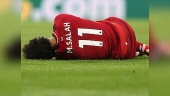 Premier League: Liverpool face anxious wait for news on gravity of Mohamed Salah's head injury