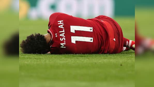 Premier League: Liverpool face anxious wait for news on gravity of Mohamed Salah's head injury