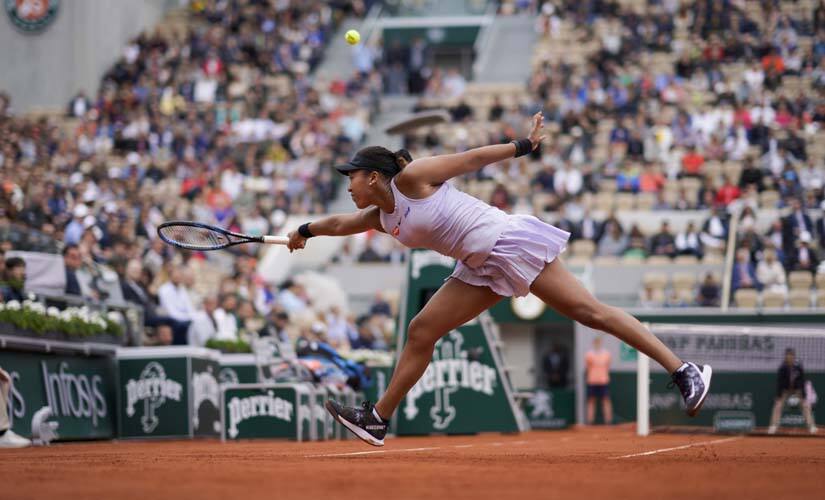 Japan's Naomi Osaka plays a backhand return to Belarus' Victoria Azarenka during their women's singles second round match. AFP