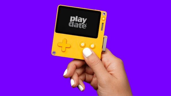 Playdate is a game console that looks like a Game Boy, and features a hand crank(?)