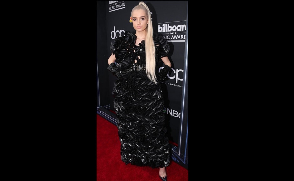 The 24-year old singer and song writer came in black overly ruffled gown for the event. Source: Twitter.