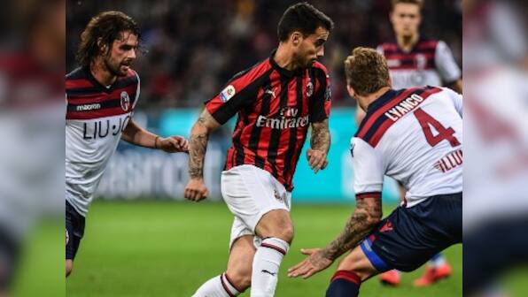Serie A: AC Milan back in Champions League race after 2-1 win over Bologna amid flaring tempers and high drama