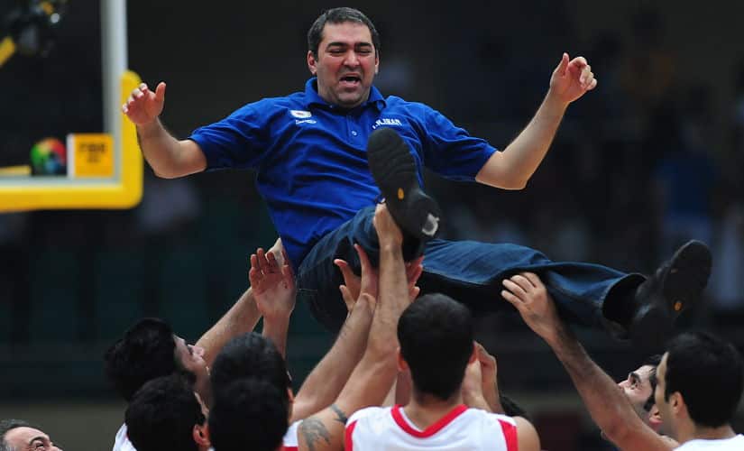 Veselin Matic is tossed in the air by jubilant Iran players following victory over China in the final of the Asian Basketball Championships in 2009. AFP