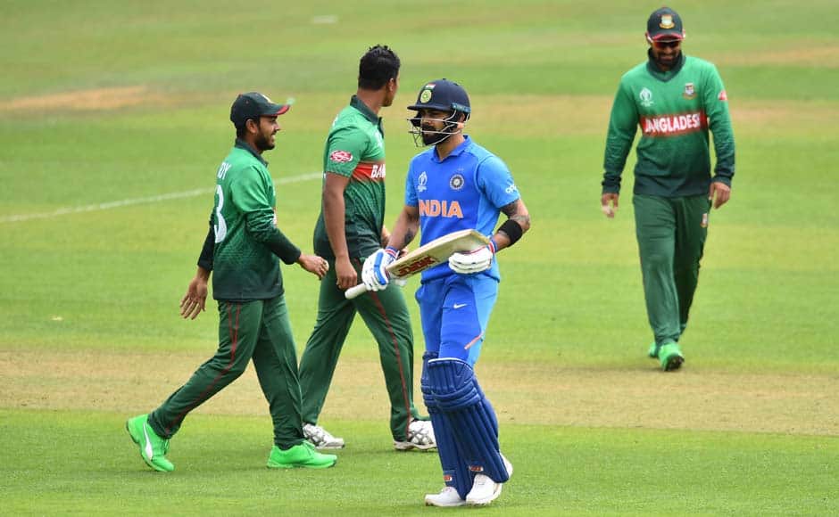 India got off to a less than ideal start against Bangladesh, with their openers falling for a combined total of 20 runs. Virat Kohli steadied the batting attack with a patient 47 off 46. AFP
