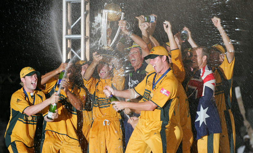 The Australian cricket team led by captain Ricky Ponting hold the ICC Cricket World Cup Trophy as they celebrate beating Sri Lanka in the final of the ICC Cricket World Cup 2007, at the Kensington Oval stadium in Bridgetown, in Barbados, 28 April 2007. Australia beat Sri Lanka by 53 runs here on Saturday to win the World Cup for the third successive time and fourth overall. AFP PHOTO/ADRIAN DENNIS (Photo by ADRIAN DENNIS / AFP)