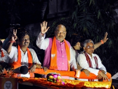 BJP, TMC supporters clash at Amit Shah's roadshow in Kolkata; BJP chief escapes unhurt after convoy attacked with stones BJP, TMC supporters clash at Amit Shah's roadshow in Kolkata; BJP chief escapes unhurt after convoy attacked with stones