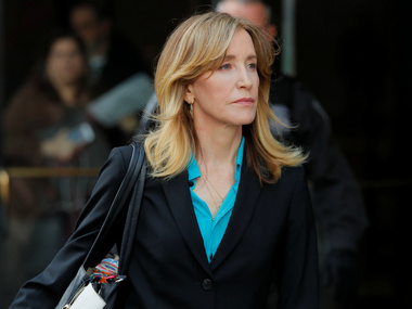 Felicity Huffman reports to California prison to serve two-week jail time in college admission scam Felicity Huffman reports to California prison to serve two-week jail time in college admission scam