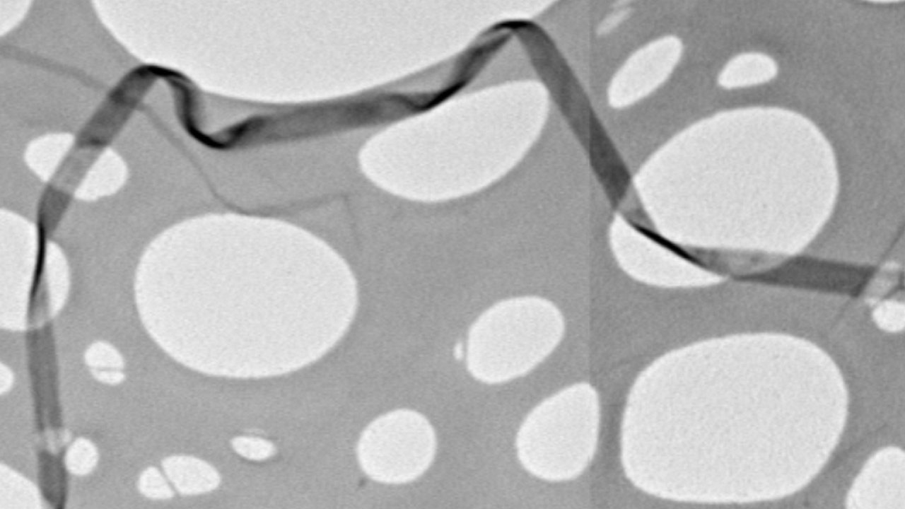The one-atom thick wonder ribbons twisting through a carbon grid. Mitch Watts/UCL, Author provided