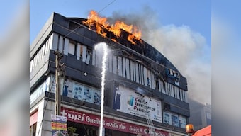 Surat fire: Tyres used as chairs, flexes aggravated blaze, distant location of fire tenders hampered operations, says official