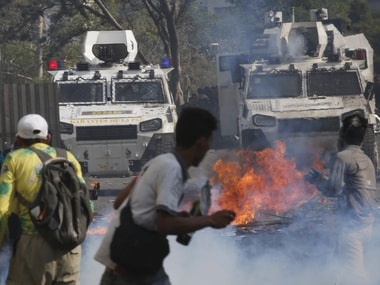 Rioting breaks out in Venezuela amid Juan Guaido's 'coup attempt'; Nicolas Maduro says Opposition trying to form 'illegitimate govt'