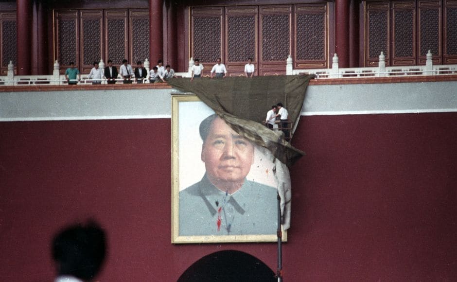 Workmen try to drape the portrait of Mao Zedong, in Tiananmen Square, 23 May, 1989. He was a founder father of the People's Republic of China and Chairman of China's Communist Party from its inception in 1949 to his death in 1976. Reuters/Ed Nachtrieb. Workmen try to drape the portrait of Mao Zedong, in Tiananmen Square, 23 May, 1989. He was a founder father of the People's Republic of China and Chairman of China's Communist Party from its inception in 1949 to his death in 1976. Reuters/Ed Nachtrieb.