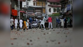 Protestors waving Zakir Musa banners clash with security forces after Eid prayers in some parts of Jammu and Kashmir
