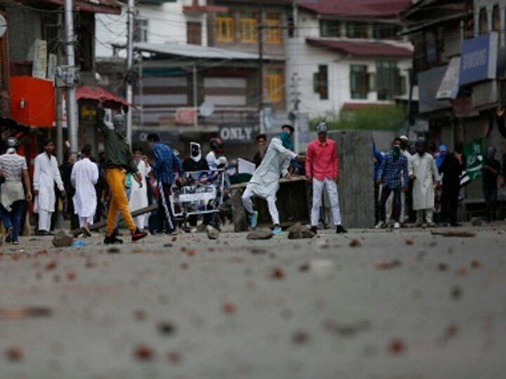 Protestors waving Zakir Musa banners clash with security forces after Eid prayers in some parts of Jammu and Kashmir