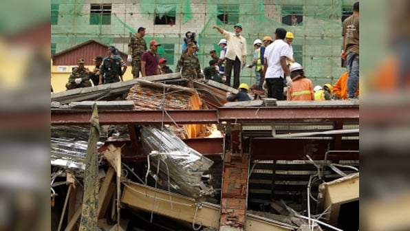 Building collapse in Cambodia leaves 18 dead, 24 injured; rescuers struggle to reach workers trapped in debris of Chinese project