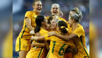 Australia's women footballers secure same minimum wages as men in landmark pay deal