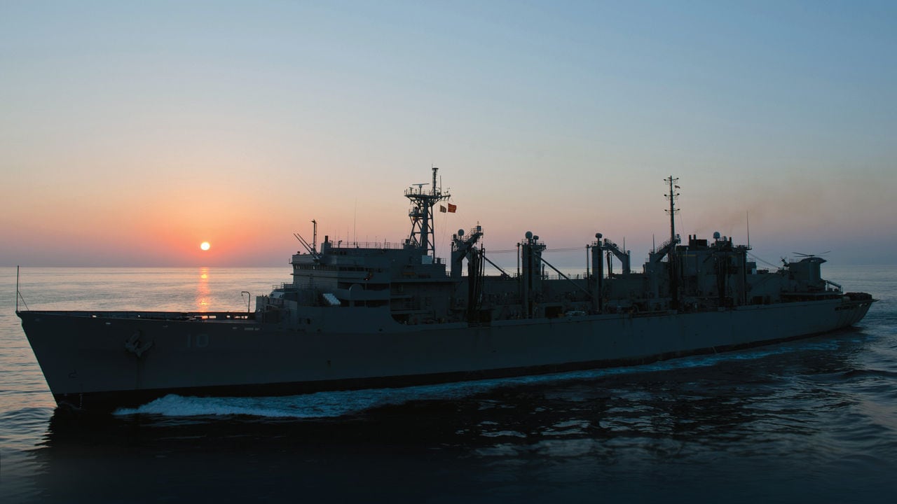 121101-N-HV737-046 ARABIAN SEA (Nov. 1, 2012) The Military Sealift Command fast combat support ship USNS Bridge (T-AOE 10) prepares to come alongside the Nimitz-class aircraft carrier USS John C. Stennis (CVN 74). John C. Stennis is deployed to the U.S. 5th Fleet area of responsibility conducting maritime security operations, theater security corporation efforts and support missions for Operation Enduring Freedom. (U.S. Navy photo by Mass Communication Specialist 2nd Class Charlotte C. Oliver/Released)