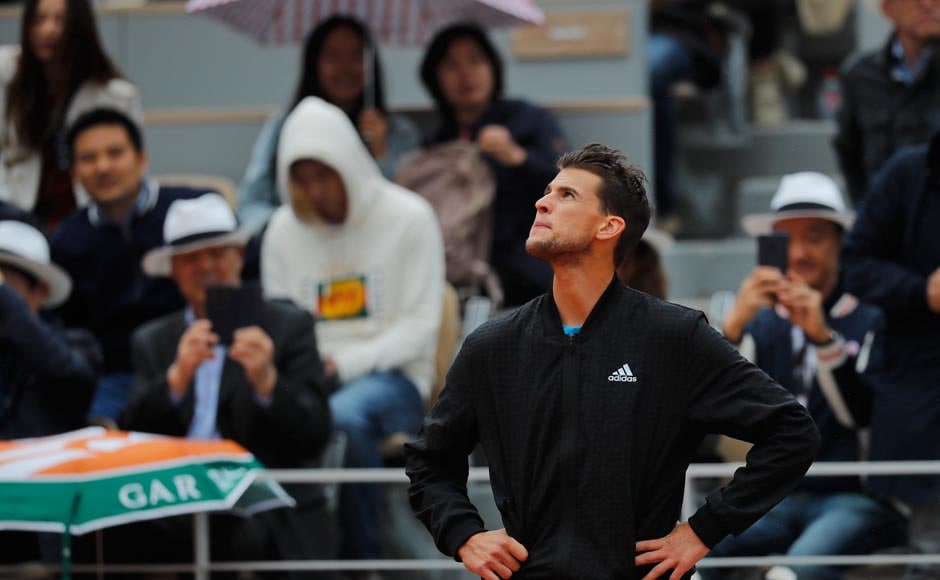 The players split the first two sets — Thiem took the opener 6-2, then Djokovic grabbed the second 6-3 — and Thiem was up a break at 3-1 in the third when action was halted. AP The players split the first two sets — Thiem took the opener 6-2, then Djokovic grabbed the second 6-3 — and Thiem was up a break at 3-1 in the third when action was halted. AP