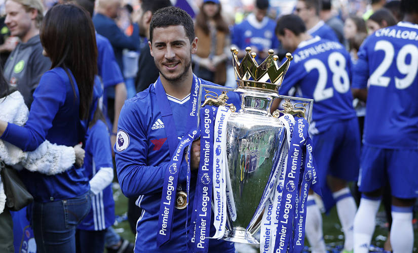 Britain Football Soccer - Chelsea v Sunderland - Premier League - Stamford Bridge - 21/5/17 Chelsea's Eden Hazard celebrates with the trophy after winning the Premier League Action Images via Reuters / John Sibley Livepic EDITORIAL USE ONLY. No use with unauthorized audio, video, data, fixture lists, club/league logos or "live" services. Online in-match use limited to 45 images, no video emulation. No use in betting, games or single club/league/player publications. Please contact your account representative for further details. - 14796808