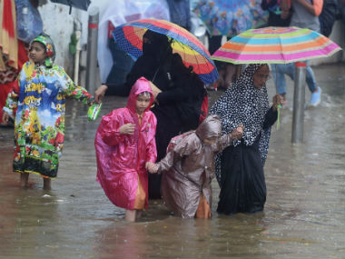 Heavy rains lash Valsad, Navsari in Gujarat; NDRF, fire brigade kept on standby as rivers swell up Heavy rains lash Valsad, Navsari in Gujarat; NDRF, fire brigade kept on standby as rivers swell up