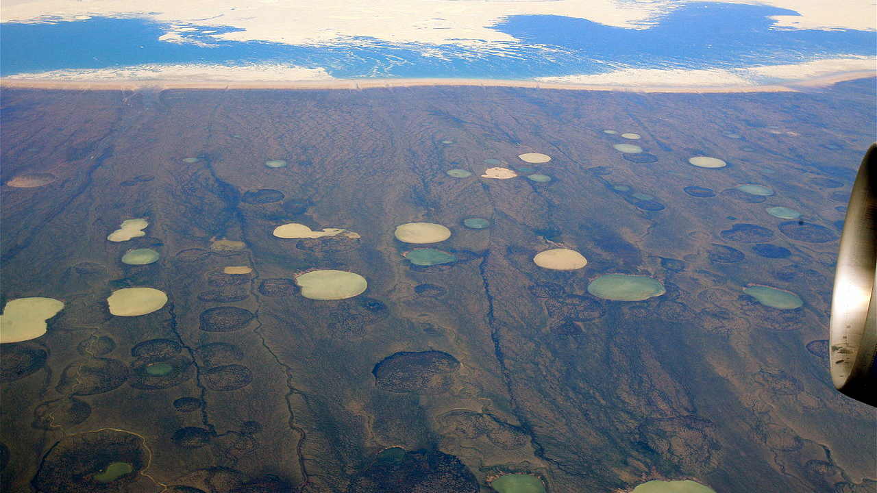 Permafrost thaw ponds in Hudson Bay Canada near Greenland. Image credit: Wikimedia commons