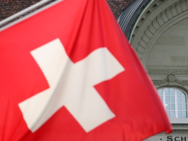 Swiss voters appear to narrowly back proposal to ban face coverings in public, projects national broadcaster Swiss voters appear to narrowly back proposal to ban face coverings in public, projects national broadcaster