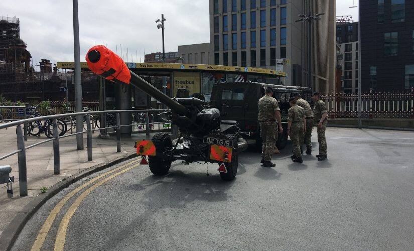 The strange sight of seeing an artillery cannon being towed by soldiers in Manchester. Image courtesy: Geoff Lemon