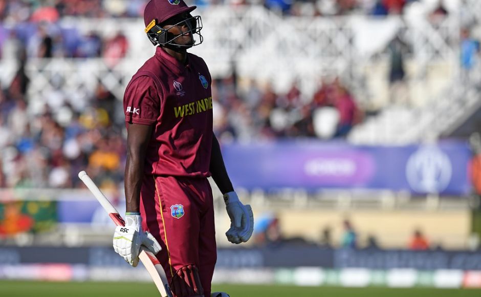 West Indies' captain Jason Holder walks back to the pavilion after losing his wicket for 51 during the 2019 Cricket World Cup group stage match between Australia and West Indies at Trent Bridge in Nottingham, central England, on June 6, 2019. (Photo by Paul ELLIS / AFP) / RESTRICTED TO EDITORIAL USE