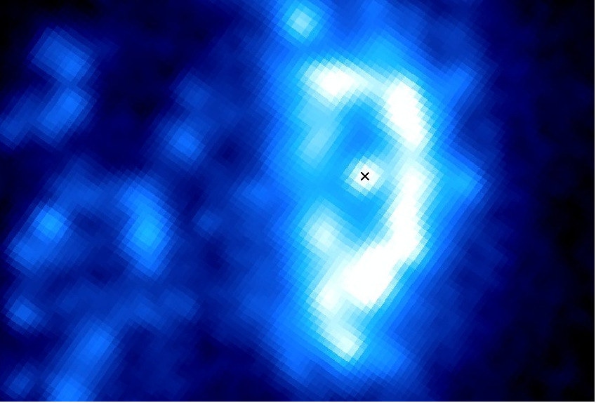 Ultraviolet image of the centre of the Jellyfish galaxy JO201 imaged using AstroSat. The cross marks the position of active galactic nucleus in the galaxy. Image credit: ISW