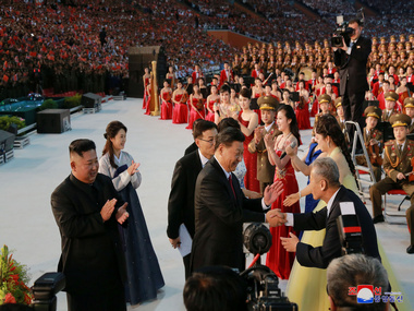 'I love you China': North Korea woos Xi Jinping in lavish welcome, features special performance 'Mass Games' by host Kim Jong-un 'I love you China': North Korea woos Xi Jinping in lavish welcome, features special performance 'Mass Games' by host Kim Jong-un