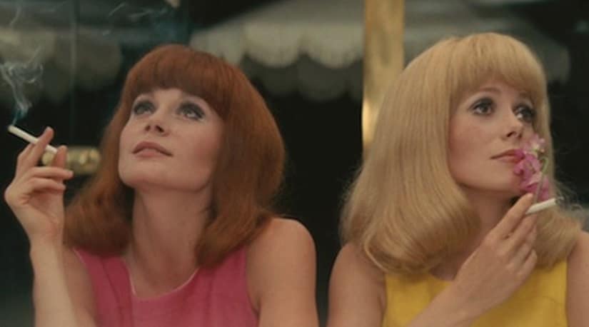 Françoise Dorléac as Solange Garnier and Catherine Deneuve as Delphine Garnier in The Young Girls of Rochefort