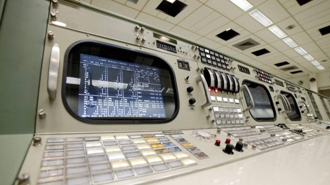 A rotary dial and other controls are shown on the console for the Instrumentation and Communications Officer, the 11th position on the third row inside the mission control room being restored to the Apollo mission era for the 50th anniversary of the Apollo moon landing at the NASA Johnson Space Center. Image: AP.