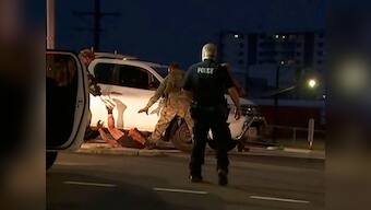 Four dead in Australia's Darwin after gunman opens fire inside motel; suspect in custody, PM calls attack 'terrible act of violence'