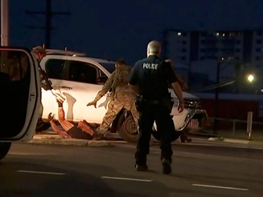 Four dead in Australia's Darwin after gunman opens fire inside motel; suspect in custody, PM calls attack 'terrible act of violence' Four dead in Australia's Darwin after gunman opens fire inside motel; suspect in custody, PM calls attack 'terrible act of violence'