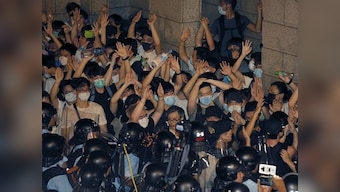 Hundreds protest in Hong Kong ahead of legislature debate on extradition law that will allow exchange of prisoners with China
