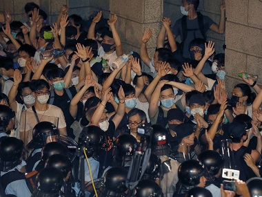 Hundreds protest in Hong Kong ahead of legislature debate on extradition law that will allow exchange of prisoners with China Hundreds protest in Hong Kong ahead of legislature debate on extradition law that will allow exchange of prisoners with China