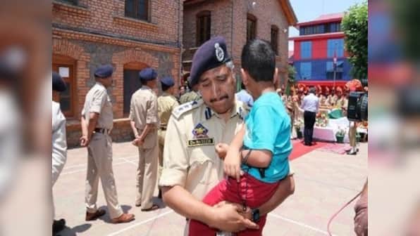 Srinagar SSP Haseeb Mughal breaks down as he carries son of cop killed in Anantnag terror attack during wreath-laying ceremony