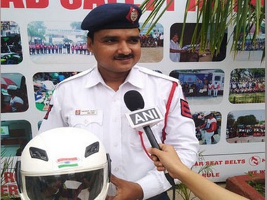 'Agar helmet nahi lagayega toh tera time ayega': Delhi traffic cop raps about road safety, spreads awareness on social media 'Agar helmet nahi lagayega toh tera time ayega': Delhi traffic cop raps about road safety, spreads awareness on social media