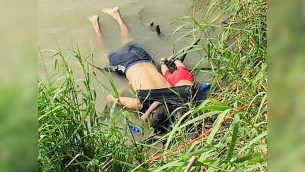 From drowned Salvadorian immigrants to The Girl in the Blue Bra, a look at most striking images depicting global crisis