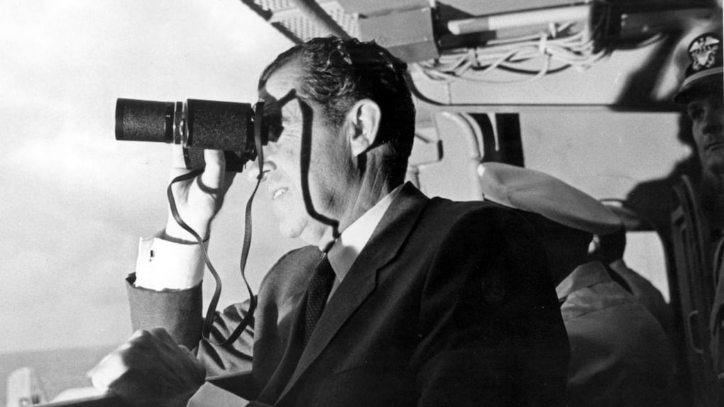 Then President Richard Nixon looks through binoculars at the recovery mission. Source: ALSJ/NASA