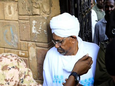 Sudan protests: Ousted president Omar-al Bashir makes first public appearance since April after being charged with corruption Sudan protests: Ousted president Omar-al Bashir makes first public appearance since April after being charged with corruption