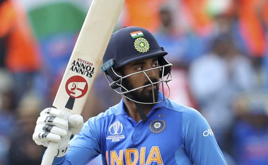 KL Rahul raises his bat after bringing up his half-century, eventually going on to score 77 AP