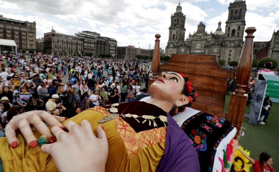 Crowds swarmed around the large creation of the artist lying on a bed. Many of Kahlo's paintings were self-portraits, her style was characterised by the vivid use of colour even as she explored several themes around death. Reuters/ Luis Cortes Crowds swarmed around the large creation of the artist lying on a bed. Many of Kahlo's paintings were self-portraits, her style was characterised by the vivid use of colour even as she explored several themes around death. Reuters/ Luis Cortes