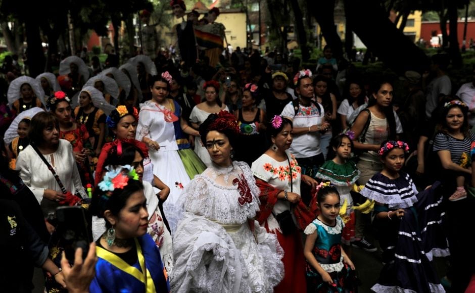 Recognised especially by her iconic uni-brow, her hair adorned with flowers and her small but visible mustache, Kahlo continues to be widely celebrated by feminists across the world. Hundreds marked the birth anniversary of the artists with a parade. Reuters/ Luis Cortes Recognised especially by her iconic uni-brow, her hair adorned with flowers and her small but visible mustache, Kahlo continues to be widely celebrated by feminists across the world. Hundreds marked the birth anniversary of the artists with a parade. Reuters/ Luis Cortes