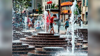 As heatwave grips Europe, region takes to public places, fountains to battle harsh weather without using air conditioners
