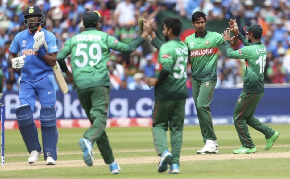 Mustafizur Rahman, the pick of the Bangladesh attack with figures of 5/59, celebrates after dismissing Hardik Pandya for a duck. AP