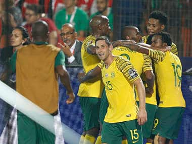 South African players celebrate after scoring against Egypt. AP