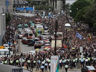 Thousands of protestors march towards Hong Kong’s controversial West Kowloon station to demand scrapping of extradition bill